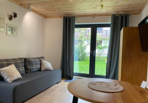 Przyjemny, samodzielny apartament z ogrodem.